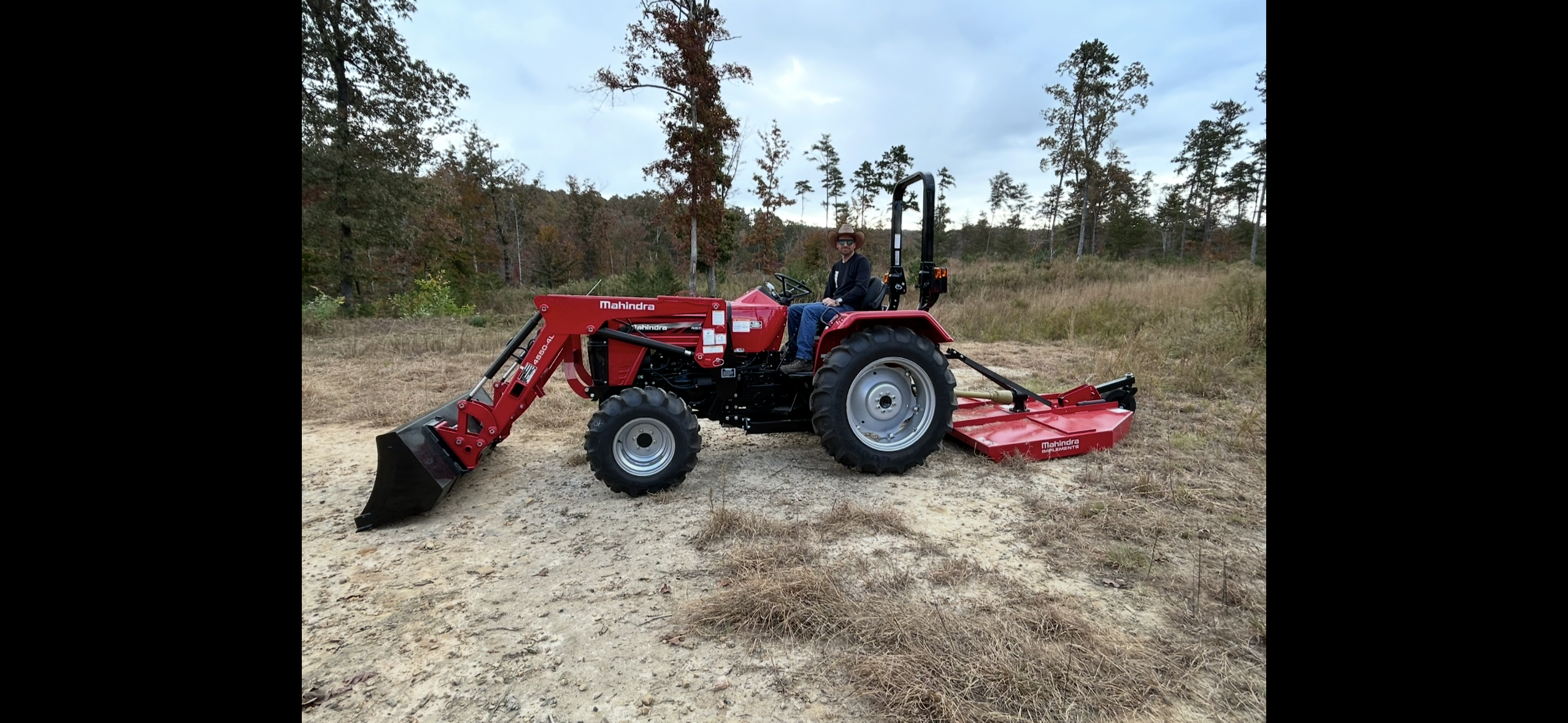 Mahindra 4550 tractor with brush hog attachment